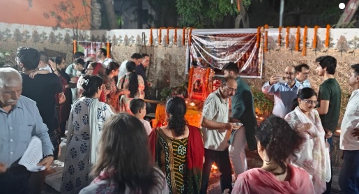 Families gather for the evening aarti  - the largest turnout the community has recorded in recent years